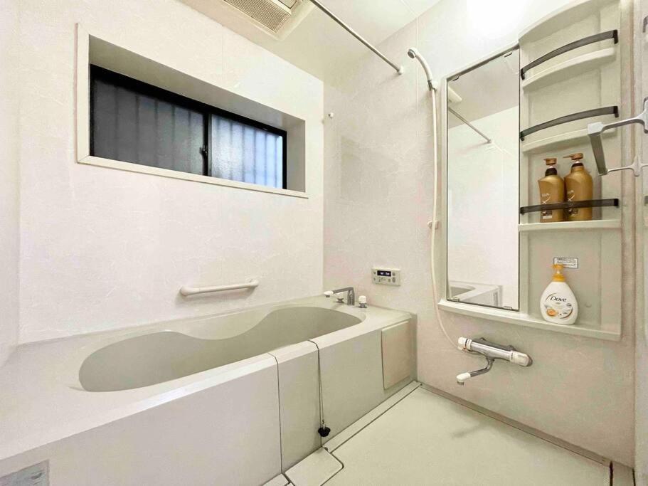 大阪鶴橋駅徒歩2分 トイレ浴室複数あり3階建て一軒家車庫付き公寓 外观 照片